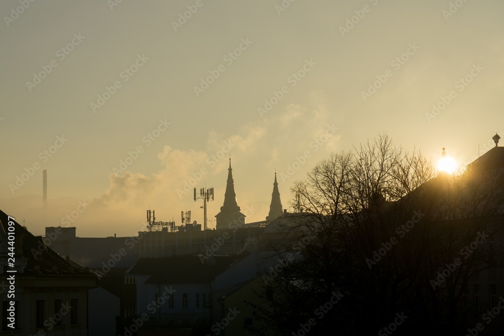 Obraz premium Sunrise and sunset over the hills and town. Slovakia