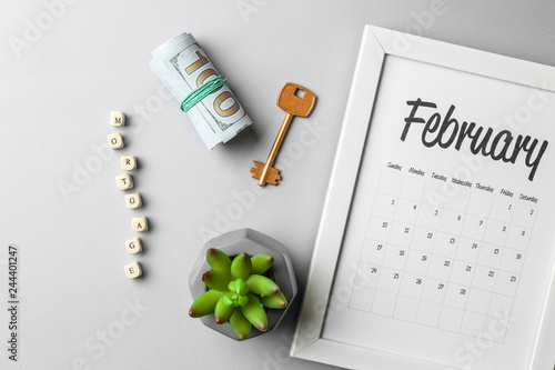 Calendar, key, money and wo...