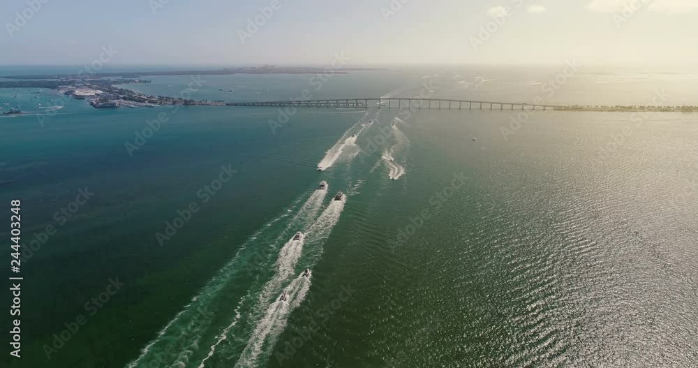 Aerial view of bridge and boats on the ocean leading to Key Biscayne, Miami Aerial view of bridge and boats on the ocean leading to Key Biscayne, Miami