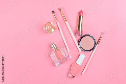  Cosmetics for makeup on a pink background. Beauty and personal care concept.