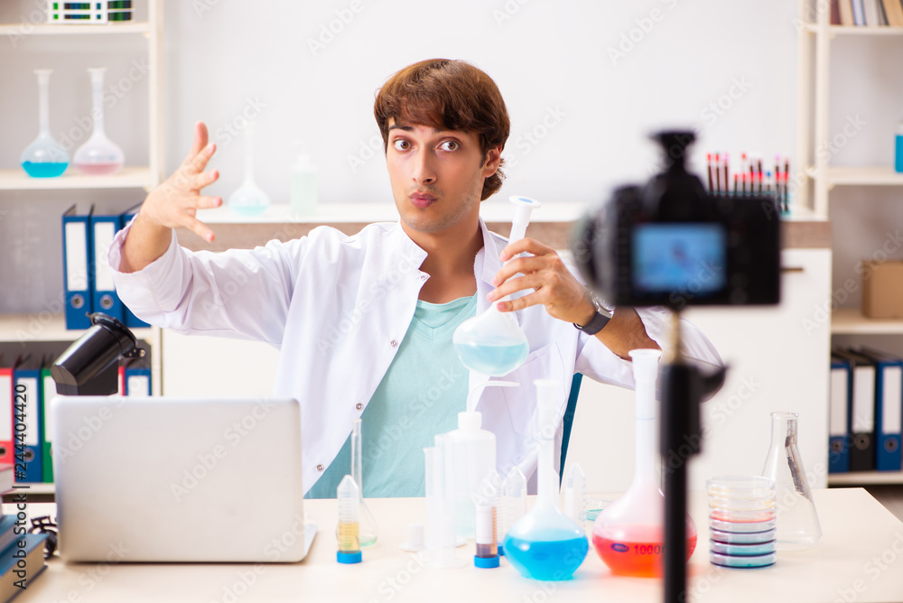 Chemist blogger recording video for his blog Chemist blogger recording video for his blog