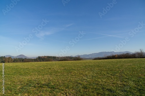 Sunny day on meadow with trees and views. Slovakia 
