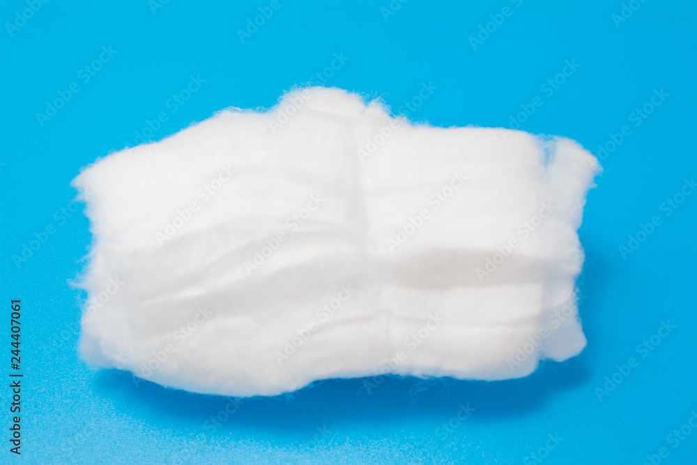 medical cotton on a blue background, medical concept medical cotton on a blue background, medical concept