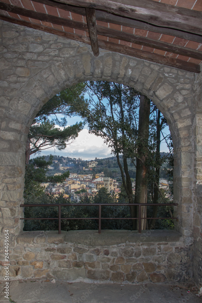 The view through an arch of San Francesco Monastery in Fiesole, Tuscany, Italy.
