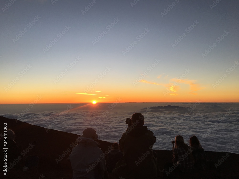 Sun setting on the clouds in Haleakala