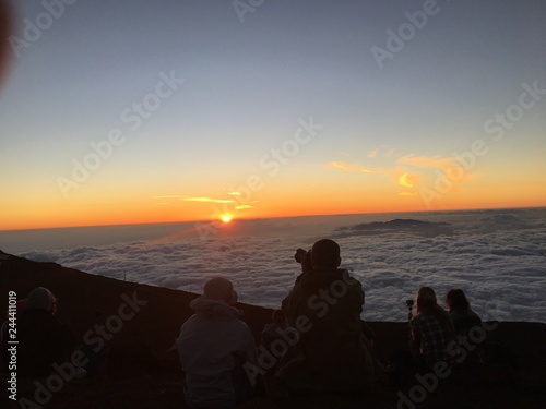 Sun setting on the clouds in Haleakala