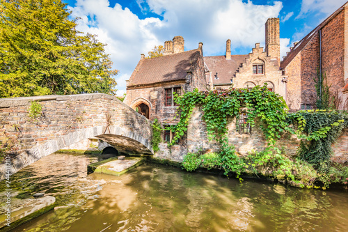 Medieval and romantic Bonifacius bridge and canal in the city centre of Bruges, Belgium photo