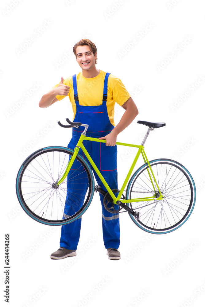 Obraz premium Man repairing his bike isolated on white background