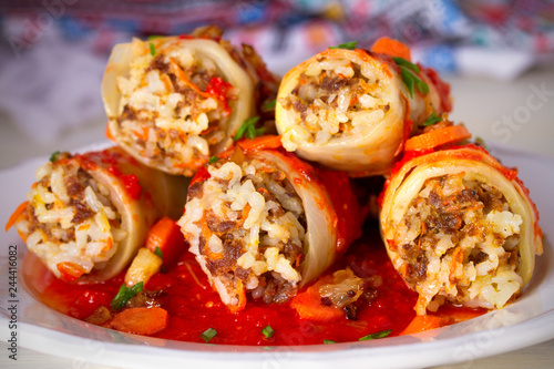 Cabbage rolls with meat, rice and vegetables. Chou farci, dolma, sarma, sarmale, golubtsy or golabki - popular dish in many countries. close-up, horizontal