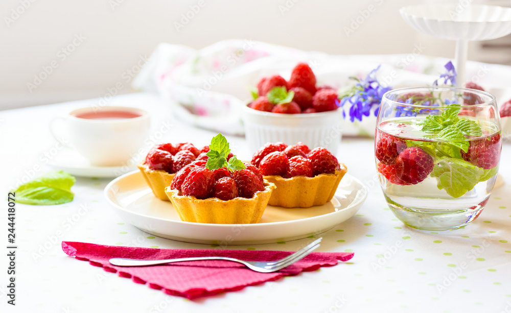 Homemade mini tarts with raspberries fruits Homemade mini tarts with raspberries fruits