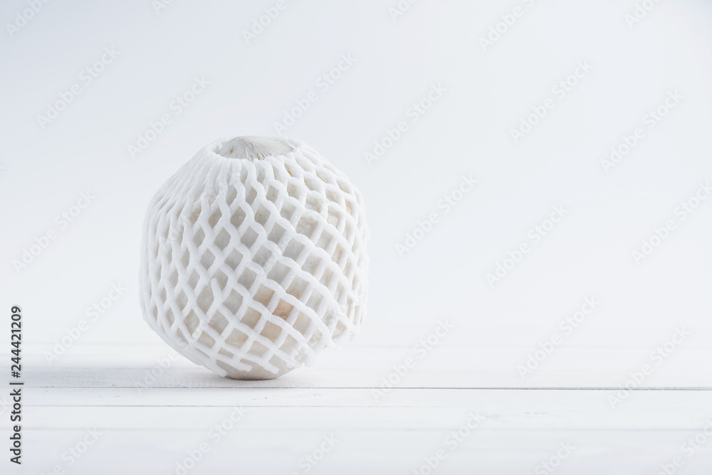 Drinking exotic coconut on a white background. Drinking exotic coconut on a white background.