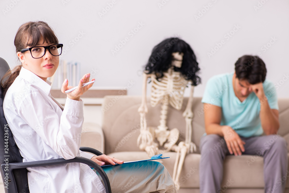 Fototapeta premium Young patient visiting psychologist for therapy