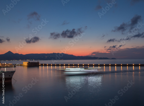 long exposure photo of ship entering the harbor © Petros