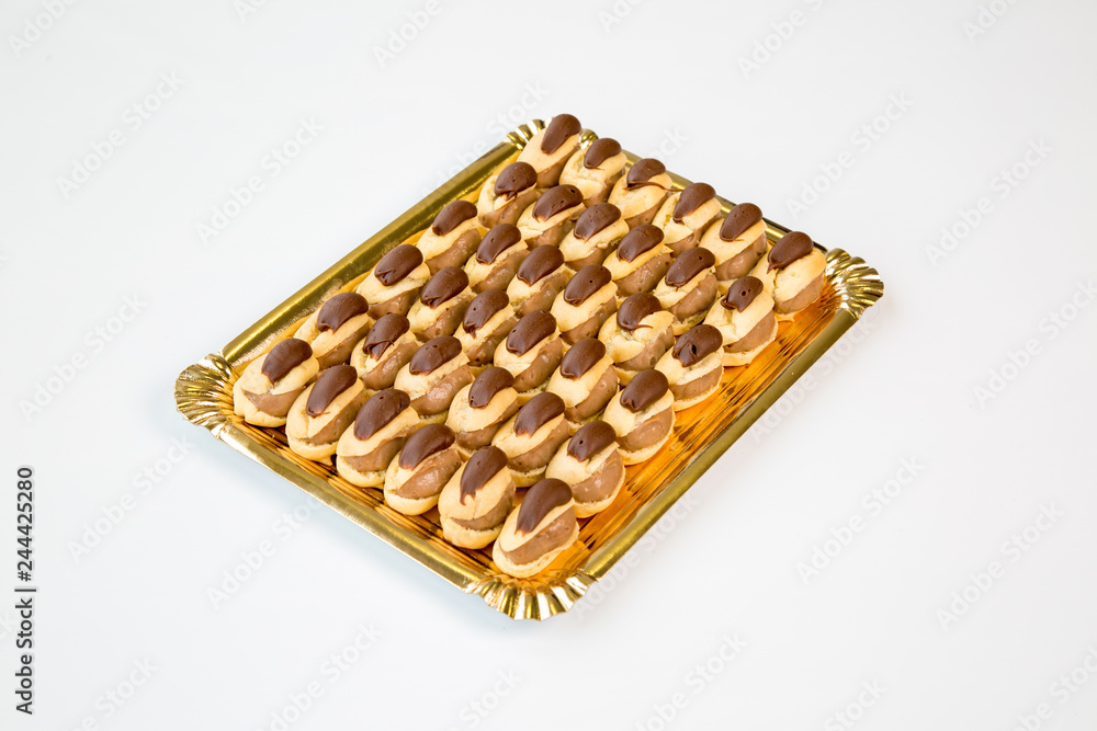 chocolate cupcakes in a tray on white background chocolate cupcakes in a tray on white background