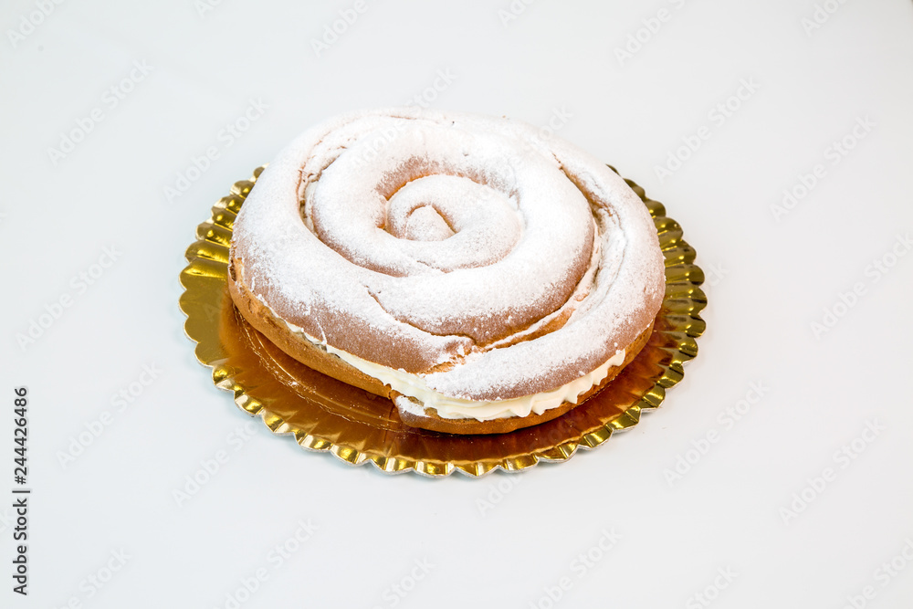 pastries in a gold tray on white background pastries in a gold tray on white background
