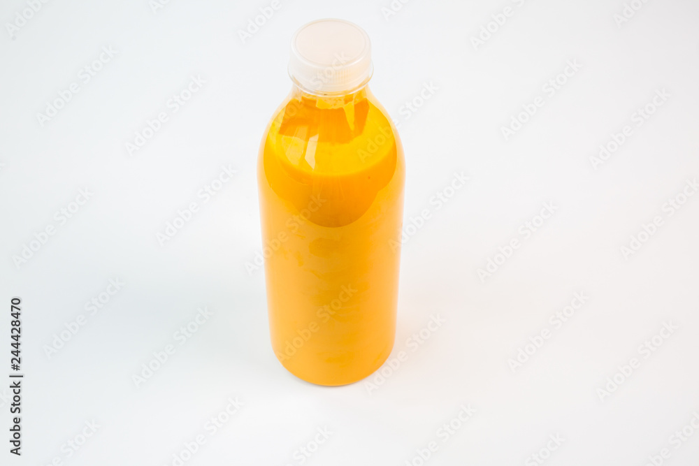 natural orange juice in a plastic bottle natural orange juice in a plastic bottle