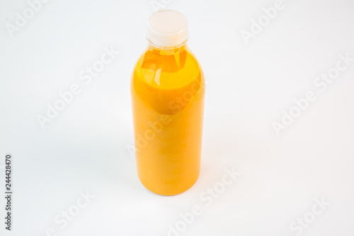 natural orange juice in a plastic bottle