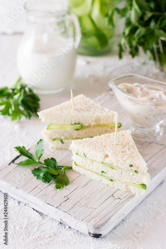 Summer snack mini sandwiches with cucumber and yogurt sauce