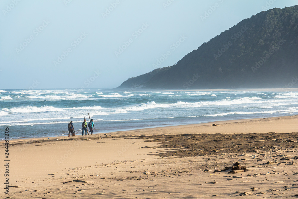 Beach of St. Lucia with fishermen, South Africa