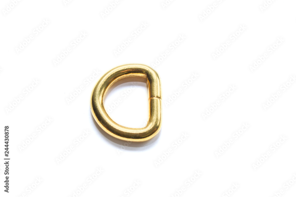 Metal half ring of golden color isolated on white background. Fittings. View from above Metal half ring of golden color isolated on white background. Fittings. View from above