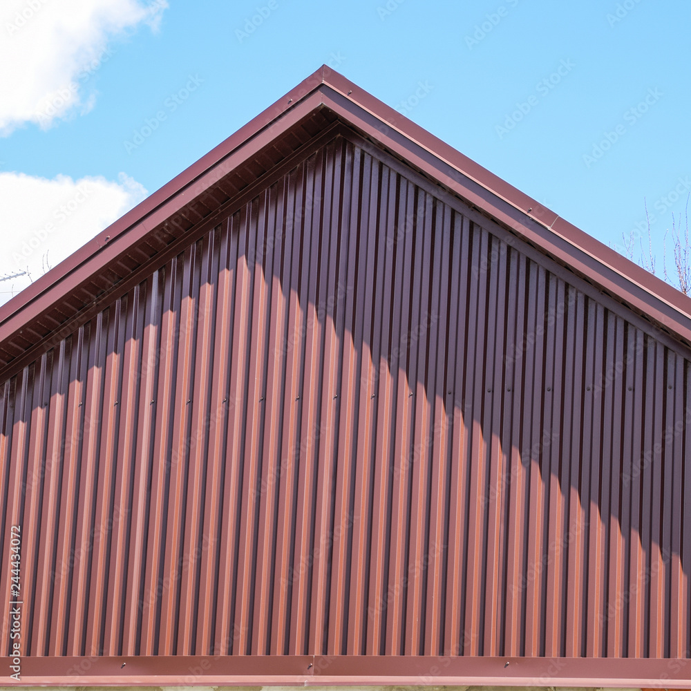 Fototapeta premium The roof of corrugated sheet
