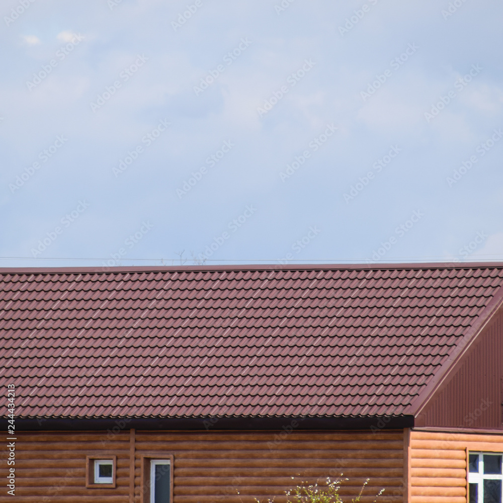 The roof of corrugated sheet on the houses The roof of corrugated sheet on the houses