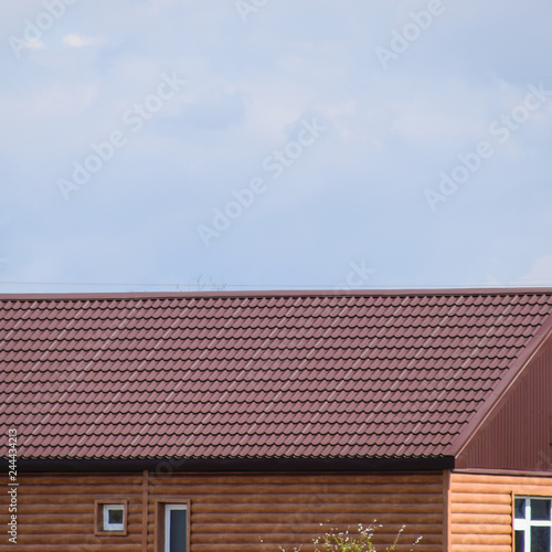 The roof of corrugated sheet on the houses
