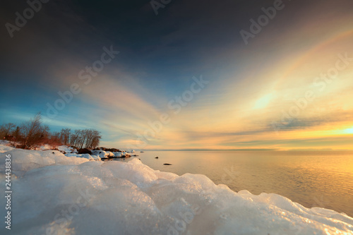 Sunset over Beach in Winter and snow