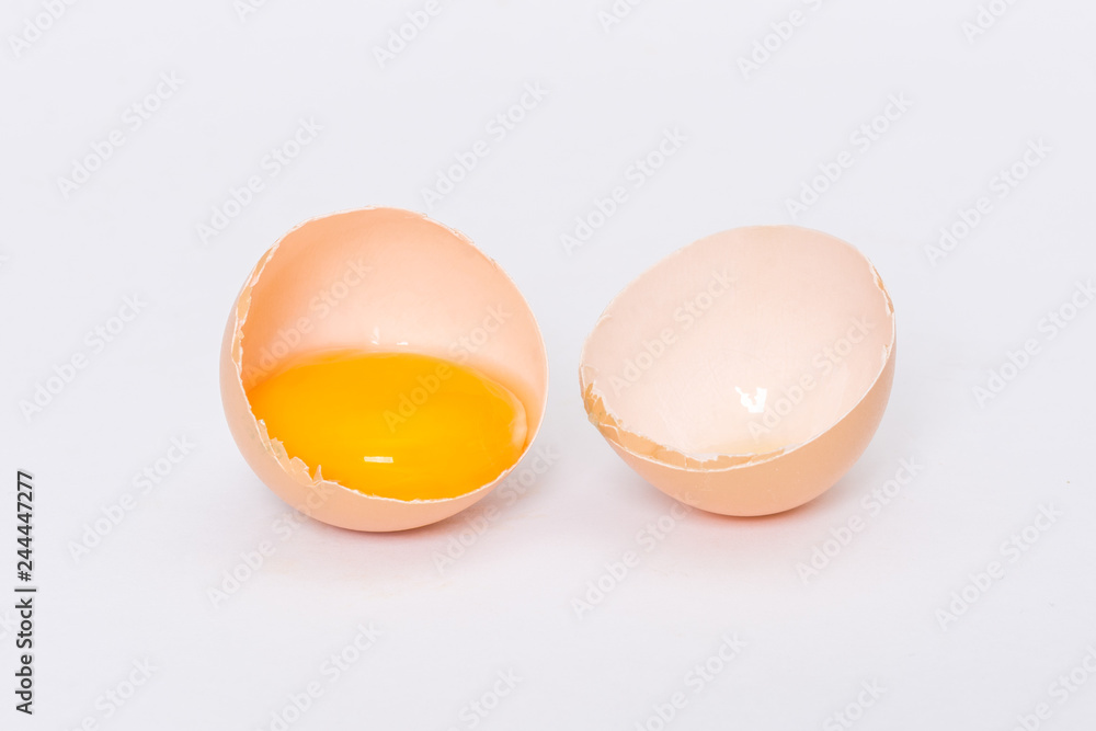 Broken egg on a white background