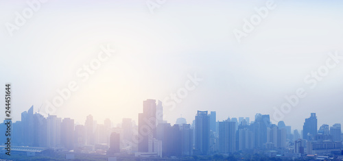Landscape view of Bangkok city background with rays of sunlight.