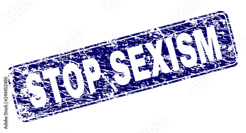 STOP SEXISM stamp seal print with grunge style. Seal shape is a rounded rectangle with frame. Blue vector rubber print of STOP SEXISM tag with grunge style.