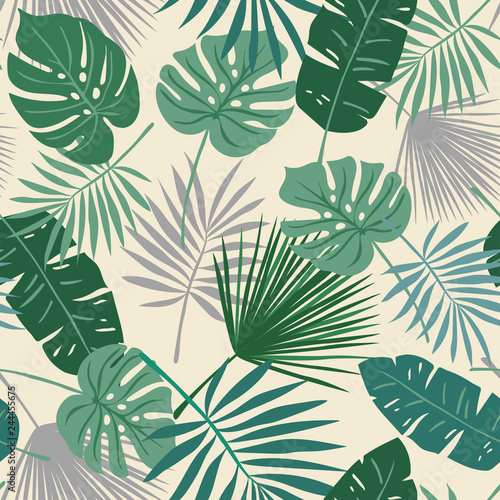 Tropical seamless repeat pattern with green leaves of different shapes on cream background