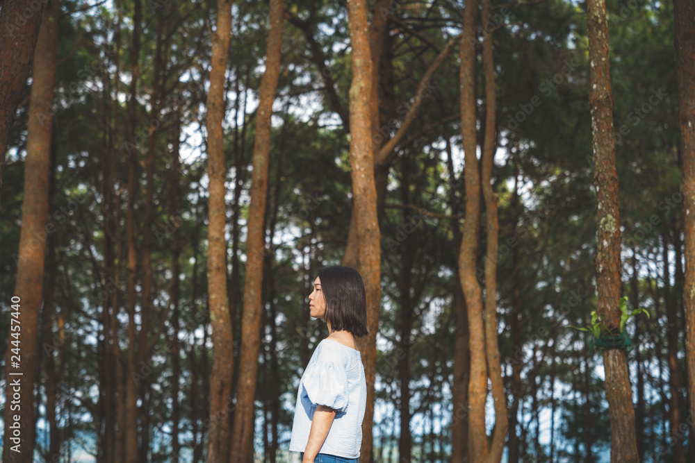 Happy young cute Asian Japanese girl hipster backpack women travelling looking at beautiful sky mountains scenery views Happy young cute Asian Japanese girl hipster backpack women travelling looking at beautiful sky mountains scenery views