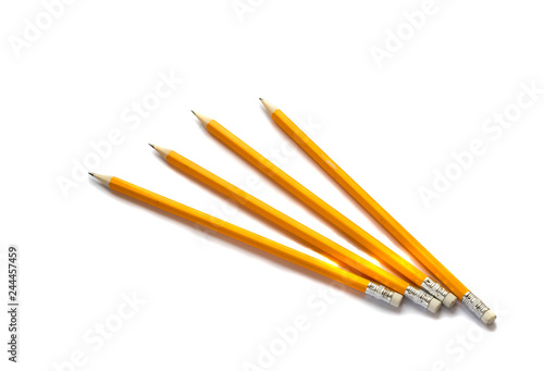 four yellow pencils on white background