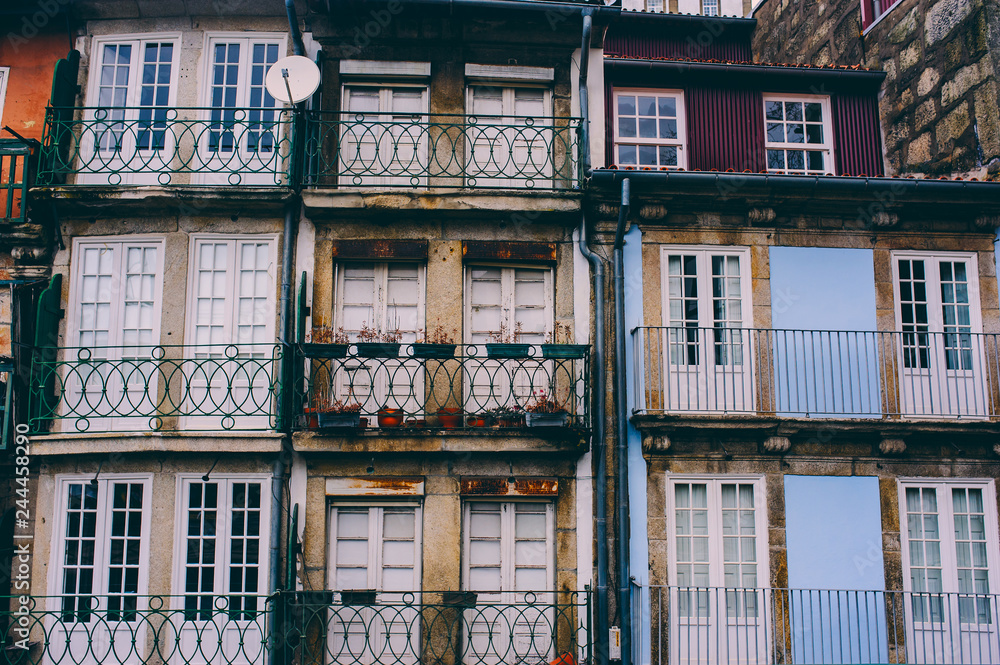 traditional facades of old houses in Porto, Portugal
