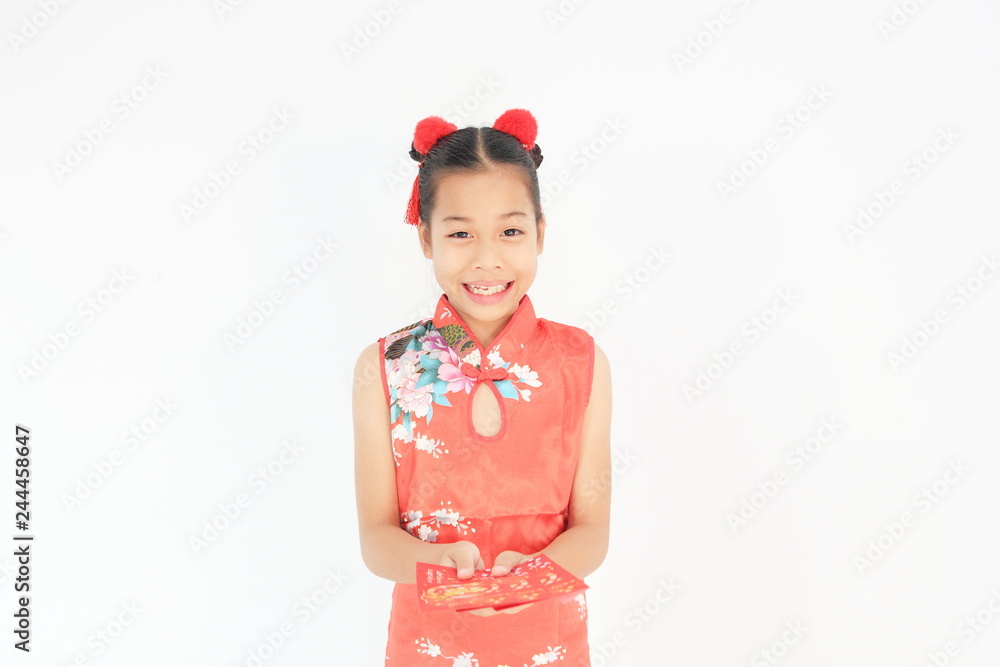 Asian Chinese child happy showing red paper packet gift on isolated white background ,Chinese new year concept. Asian Chinese child happy showing red paper packet gift on isolated white background ,Chinese new year concept.