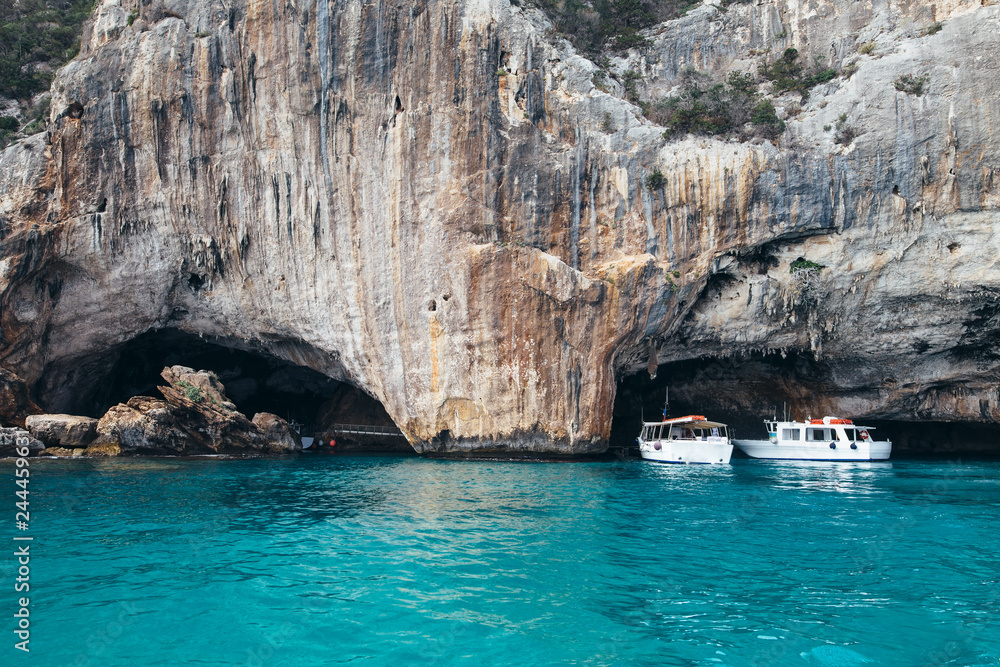 Amazing blue waters of the mediterranean sea in grotto Cala Luna, Sardinia
