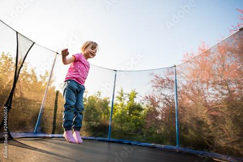 Cheerful kid enjoying during her leisure time