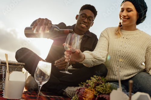 Interracial couple on romantic date photo