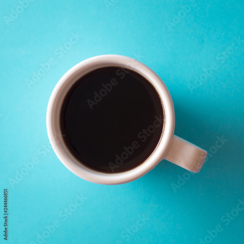 cup of coffee on blue background