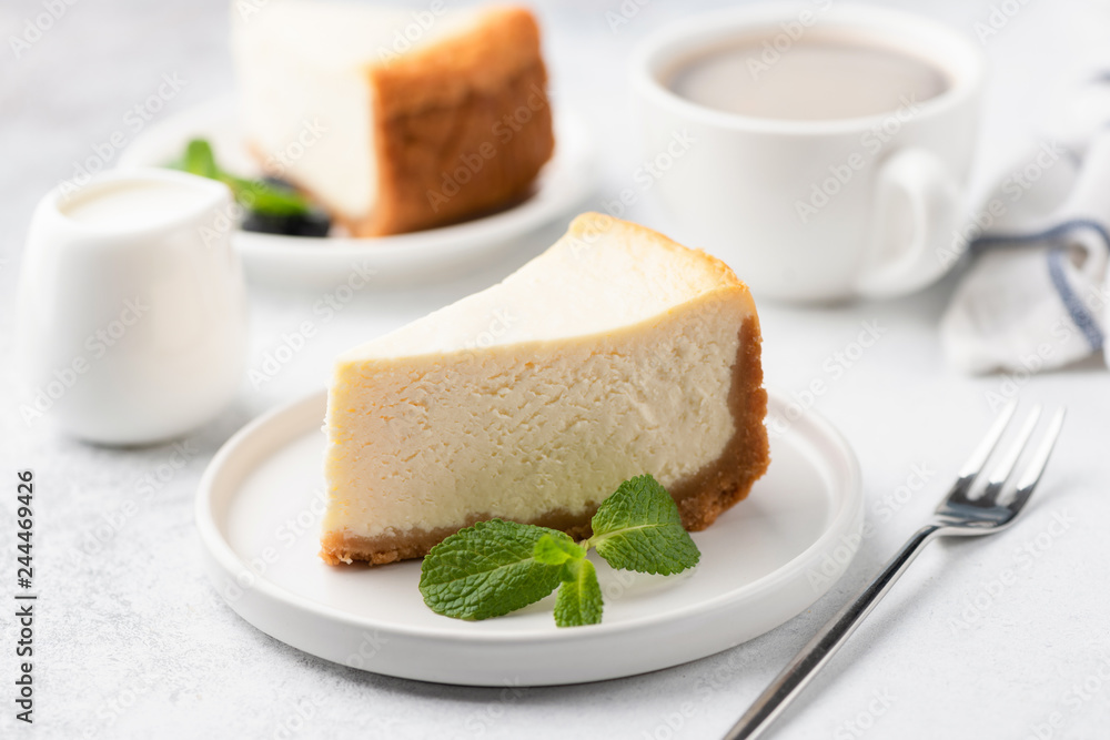 Tasty Cheesecake with Coffee on white plate. Cake and coffee. Coffee time. Selective focus Tasty Cheesecake with Coffee on white plate. Cake and coffee. Coffee time. Selective focus
