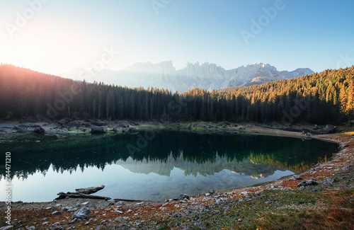 No people, only pure beauty of nature. Autumn landscape with clear lake, fir forest and majestic mountains © standret
