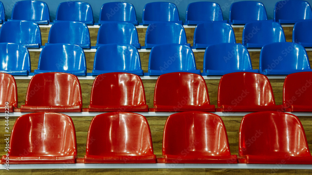 Fototapeta premium Plastic chairs at stadium