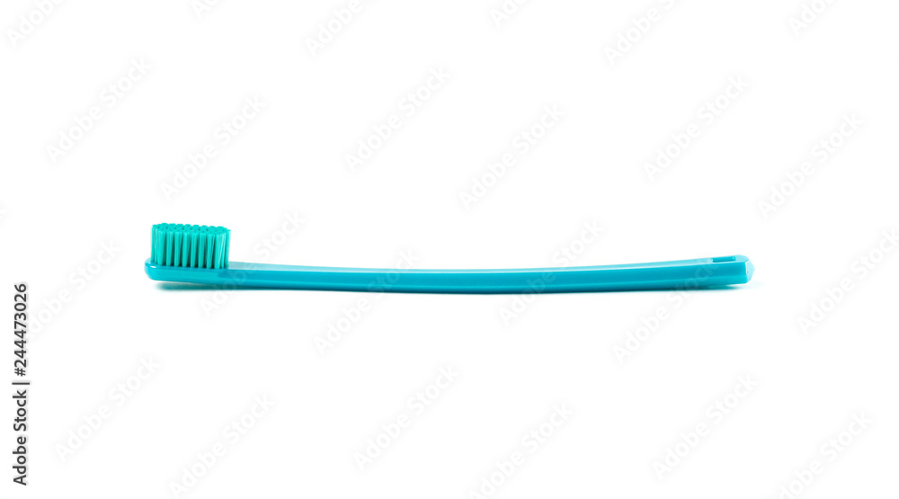 Beautiful blue toothbrush. Close up. Isolated on white background Beautiful blue toothbrush. Close up. Isolated on white background