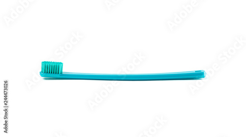 Beautiful blue toothbrush. Close up. Isolated on white background