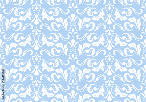Wallpaper in the style of Baroque. Seamless vector background. White and blue floral ornament. Graphic pattern for fabric, wallpaper, packaging. Ornate Damask flower ornament