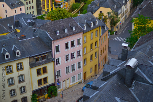 Typical colorful houses with the street and pavement at the old town of Luxembourg, Europe photo