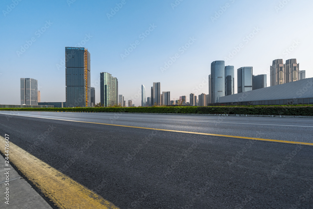 urban traffic road with cityscape in background, China.