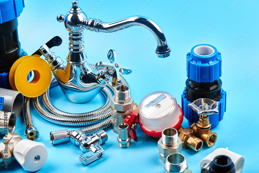 plumbing tools and equipment on blue background. - obrazy, fototapety, plakaty 