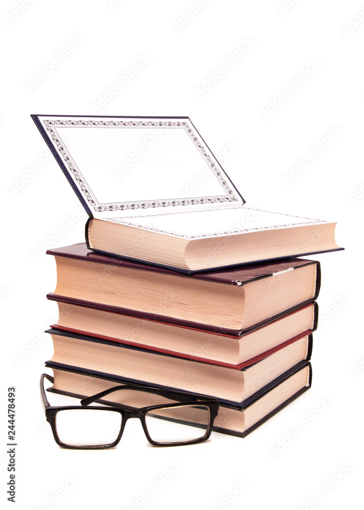 Old classic book and glasses on white background Old classic book and glasses on white background
